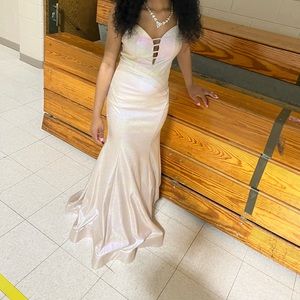 This dress is a size 3-4. It fit very well around the waist and straps!